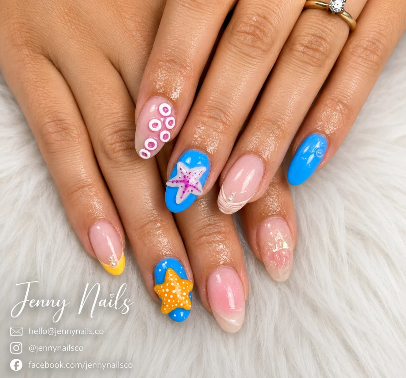 Blue and cream almond nails with delicate accents