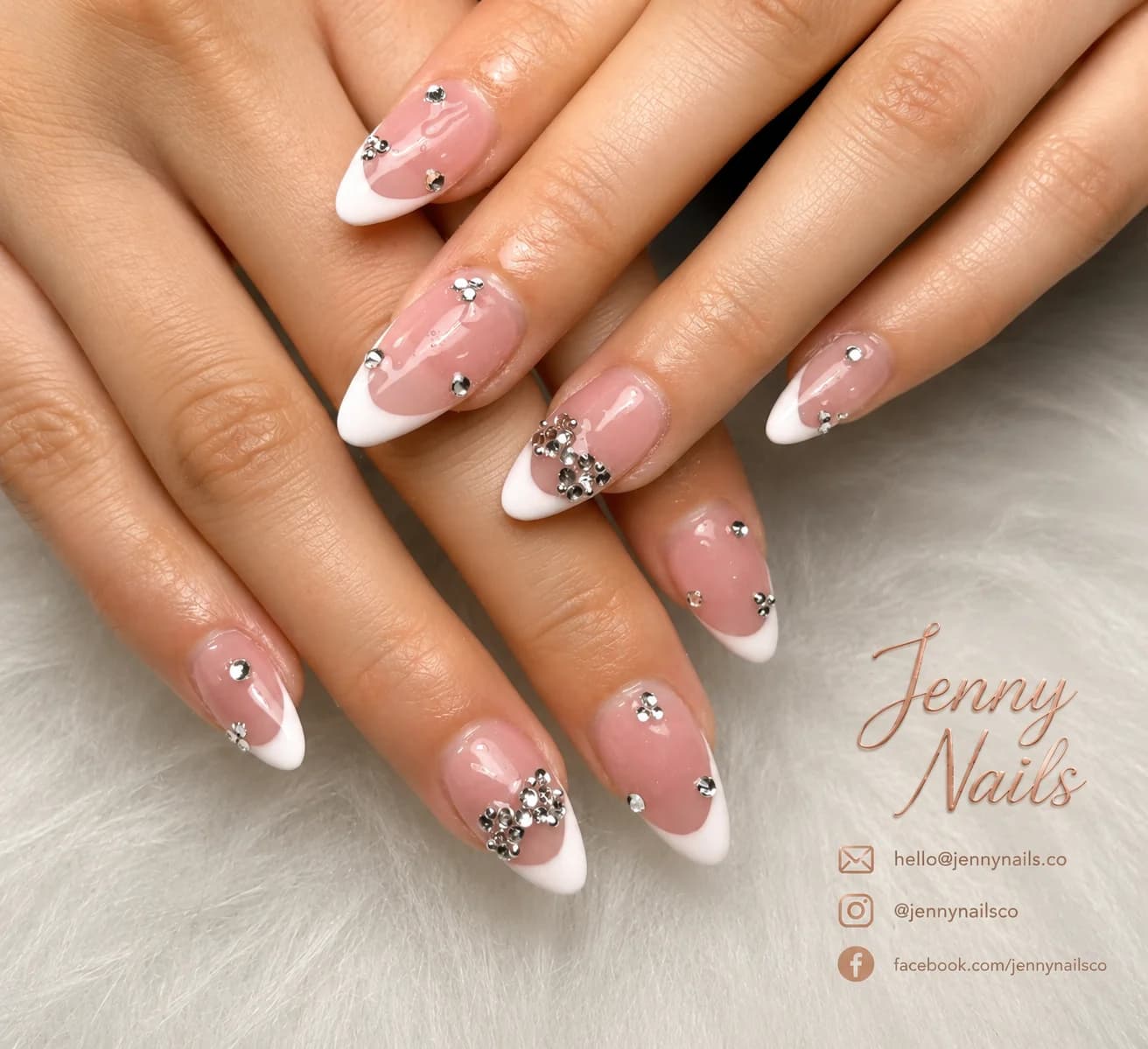 Glossy red and pink nails with white flower art