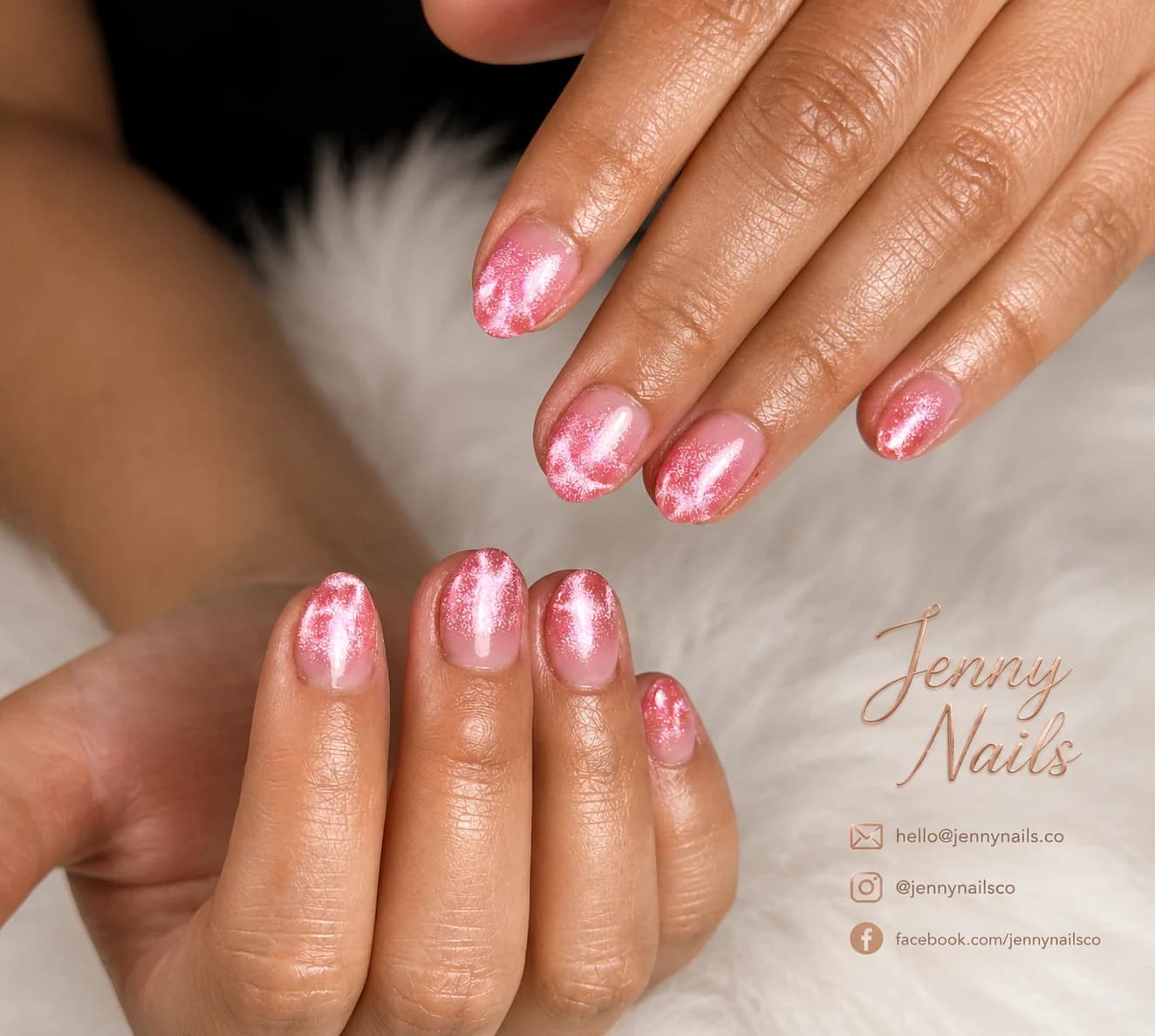 Bright pink, black, and white nails with star accents
