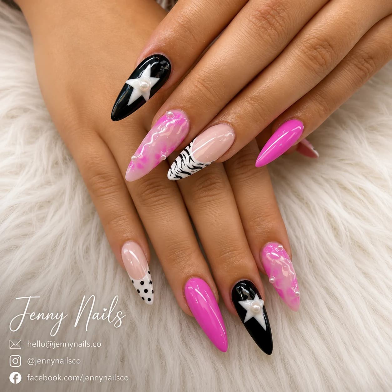 Colorful ocean-themed nails with blue accent art