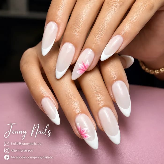 Soft milky white floral nails at Elysian Nails & Spa in Green Valley, Arizona