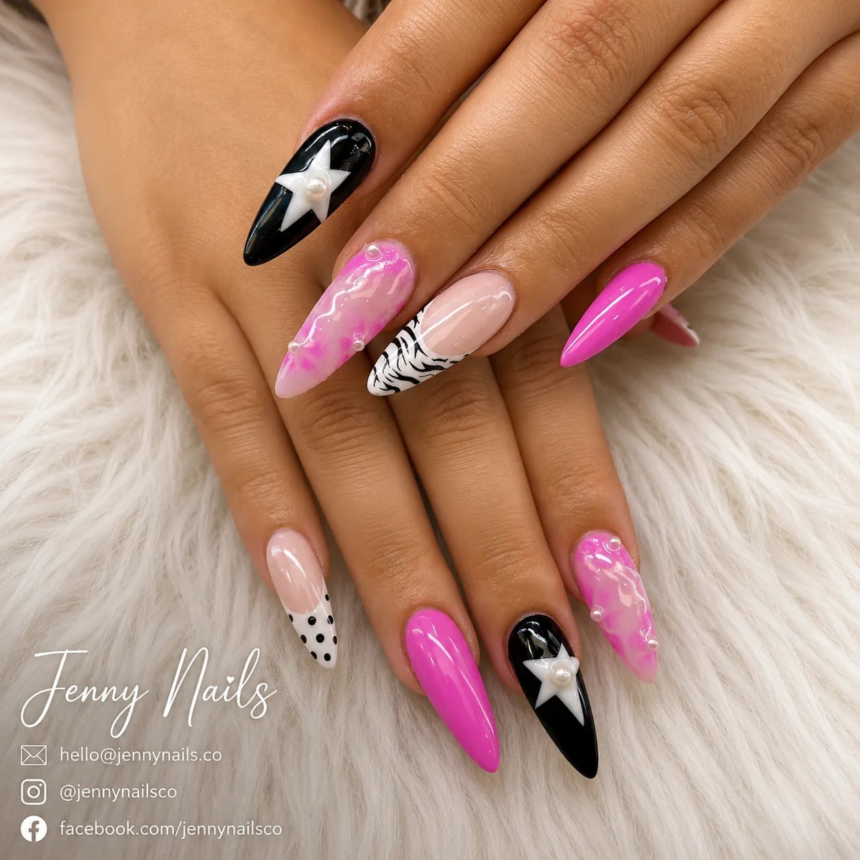 Detailed hand-painted nail art on a finished manicure
